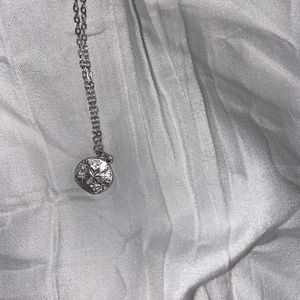 Silver sand dollar necklace